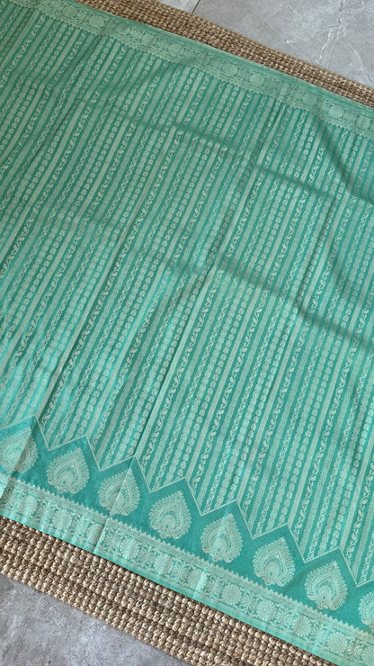 Elegant Georgette Crepe Silk Saree with Silver Banarasi Borders - Aqua/ Sea green