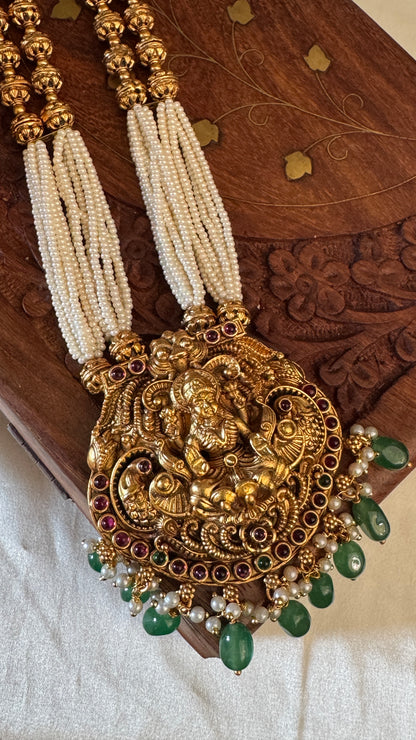 Gold Plated Long White Beaded Temple jewellery Set - Lakshmi Pendant and Jhumka