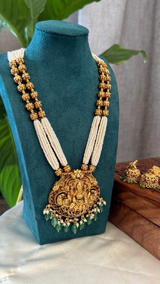 Gold Plated Long White Beaded Temple jewellery Set - Lakshmi Pendant and Jhumka