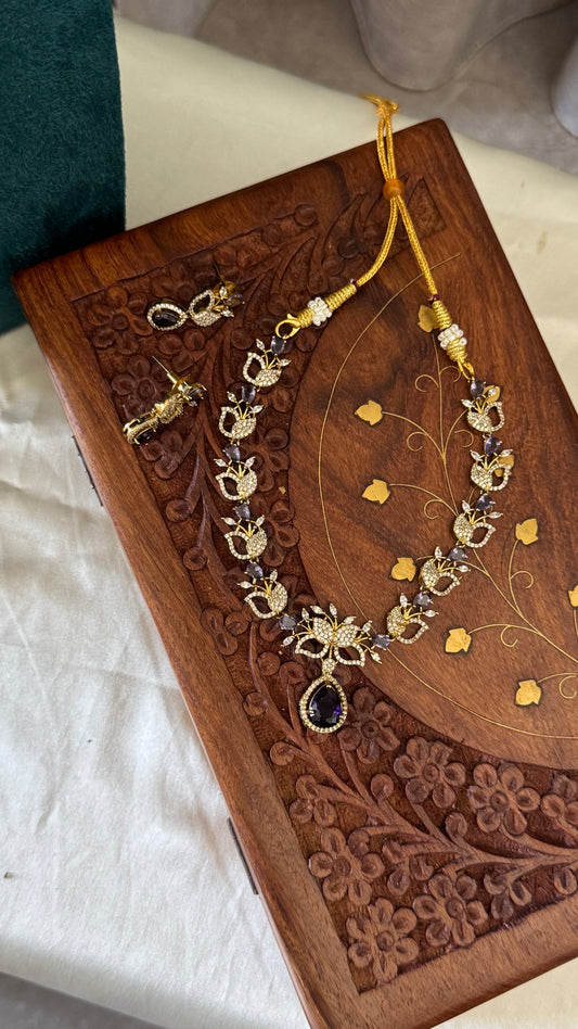 Handcrafted Necklace and Earring Set with AD Stones - White and Purple stones