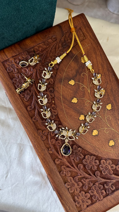 Handcrafted Necklace and Earring Set with AD Stones - White and Purple stones