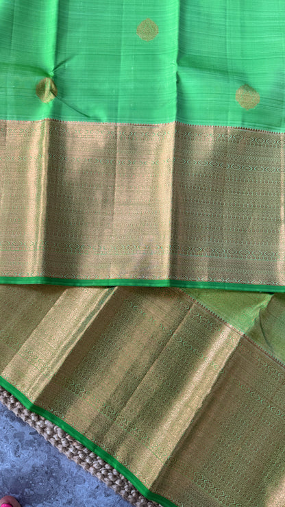 Pure Handloom Kanchivaram Silk Saree with Silver Zari Motifs and Double-Sided Border - Green