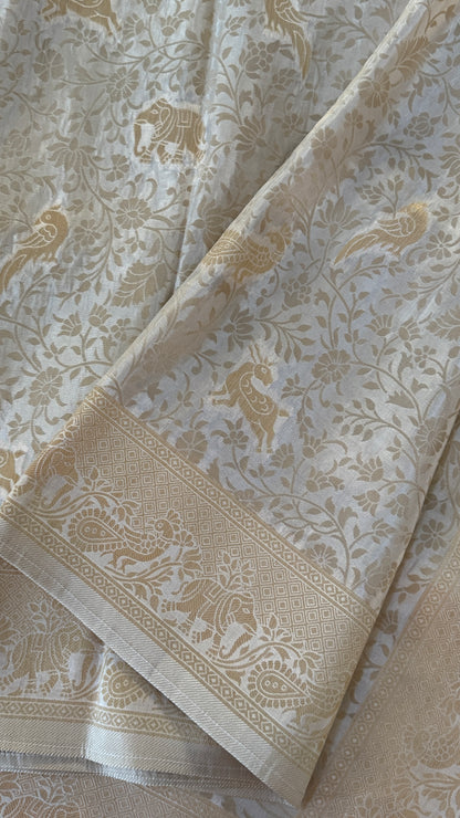 Soft Tissue Silk Saree in Half White Shade with Intricate Animal Motifs