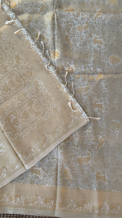 Soft Tissue Silk Saree in Half White Shade with Intricate Animal Motifs