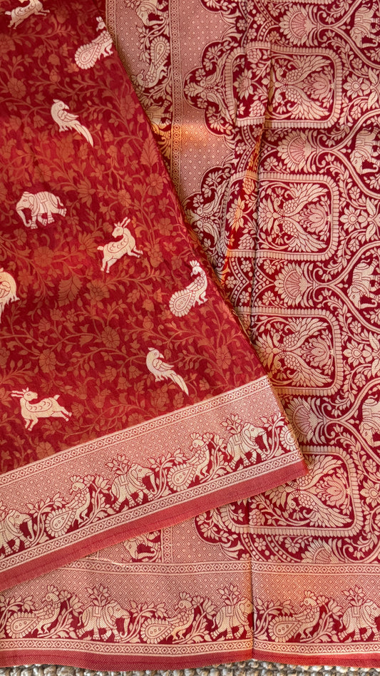 Soft Tissue Silk Saree in Unique Rust Shade with Intricate Animal Motifs