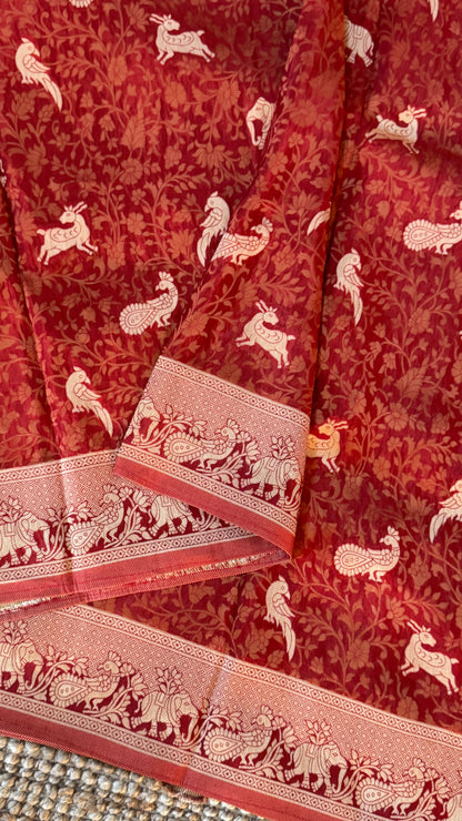 Soft Tissue Silk Saree in Unique Rust Shade with Intricate Animal Motifs