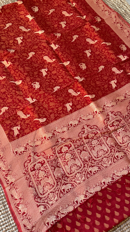 Soft Tissue Silk Saree in Unique Rust Shade with Intricate Animal Motifs