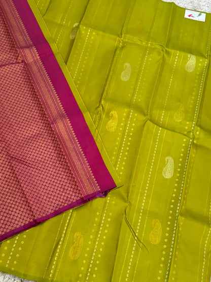 KANJIVARAM PURE SILK BORDERLESS SAREE – PARROT GREEN WITH MAGENTA PALLU