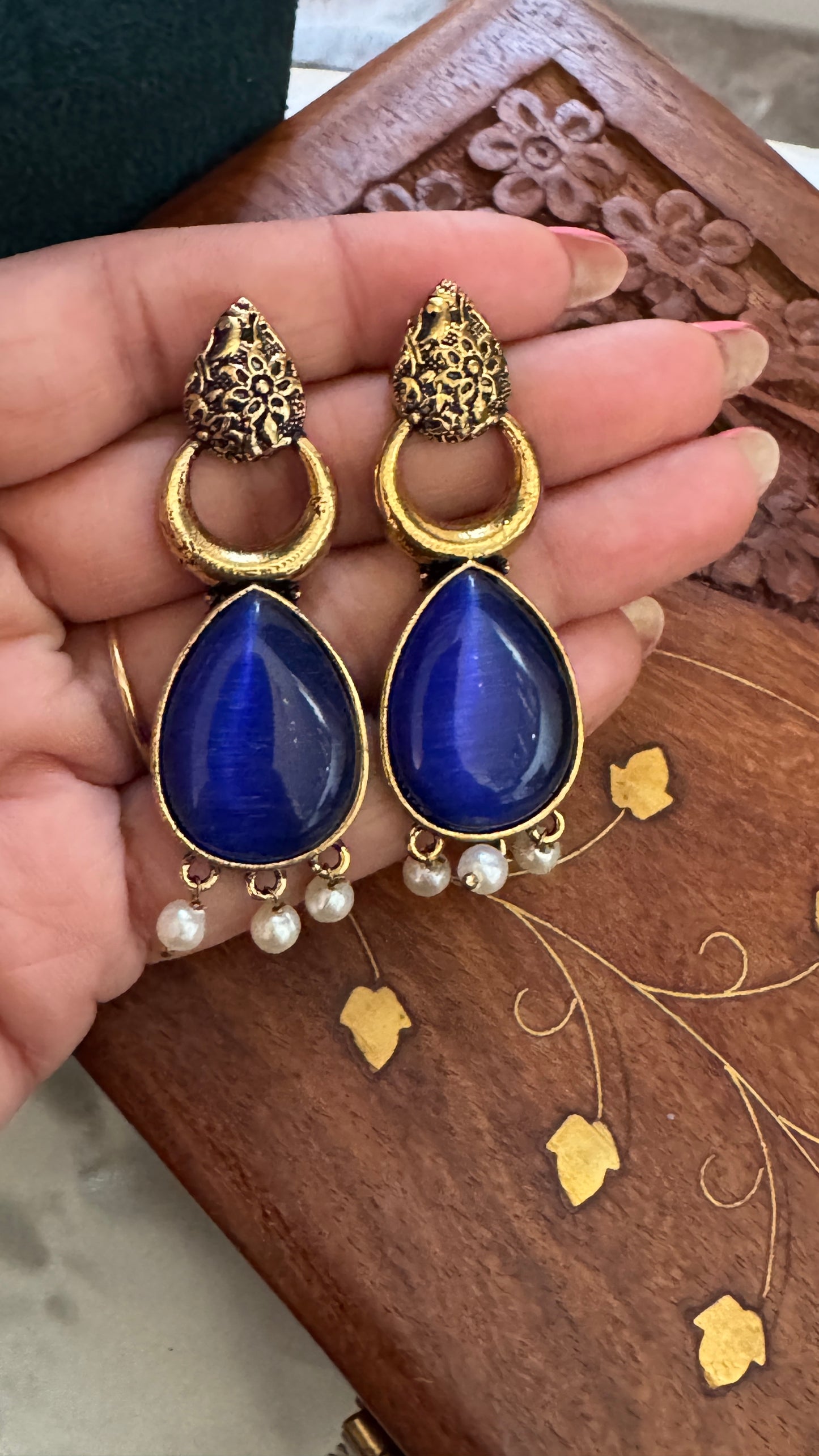 Antique Black Gold Finish Jhumka with Blue Stone and Pearl Drops