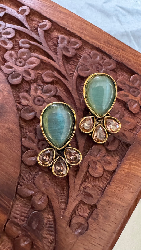 Antique Black Gold Finish Jhumka with Mint Green Stone stud