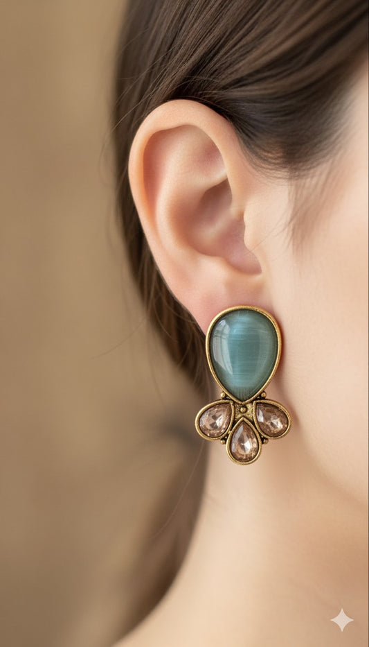 Antique Black Gold Finish Jhumka with Mint Green Stone stud