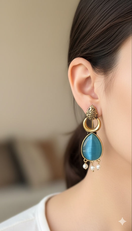 Antique Black Gold Finish Jhumka with Blue Stone and Pearl Drops